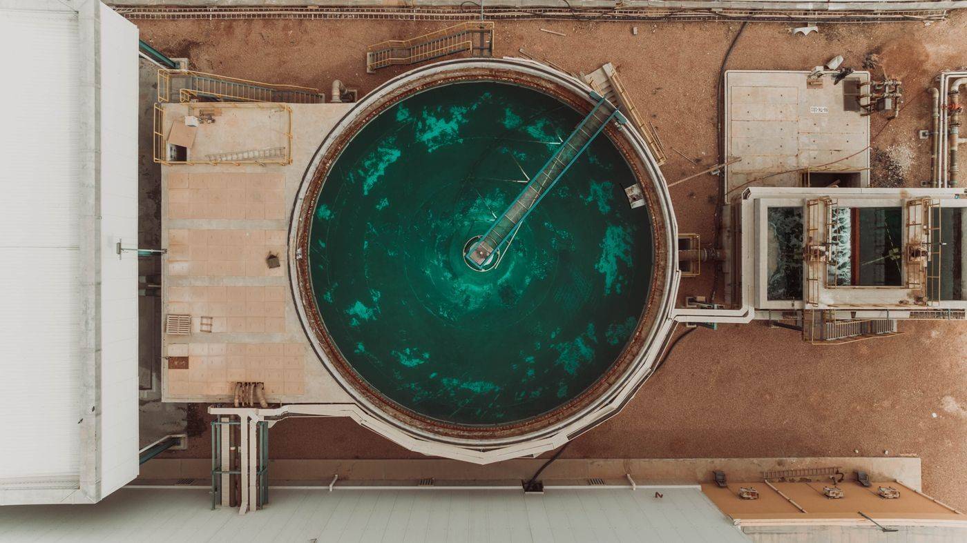 Industrial water treatment tank and containment structure